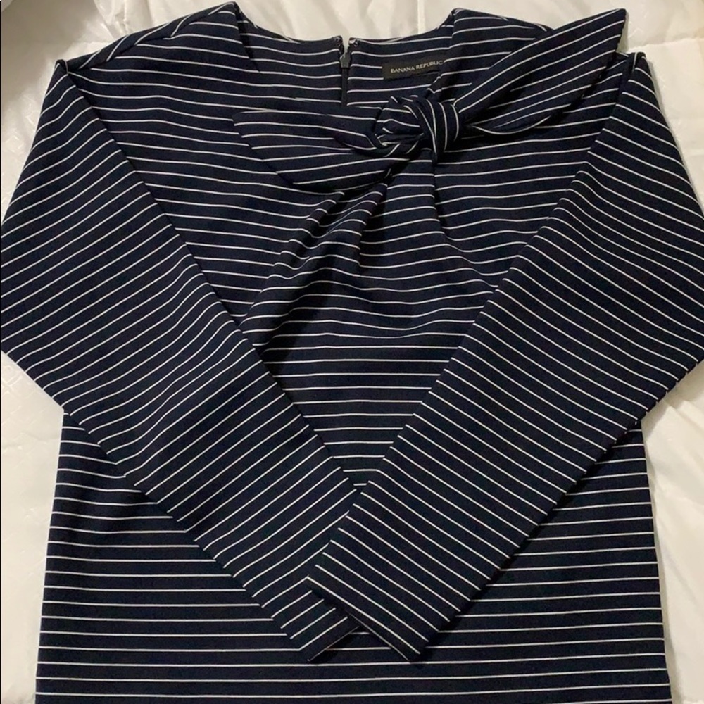 navy blue and white striped longsleeve top